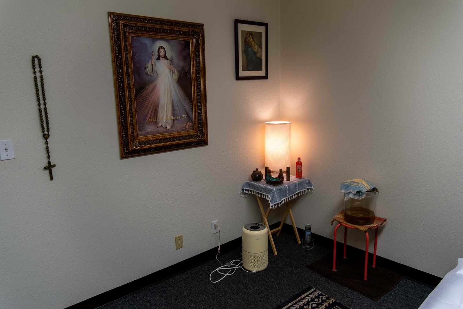 The healing room altar with Divine Mercy painting, rosary, and sacred objects
