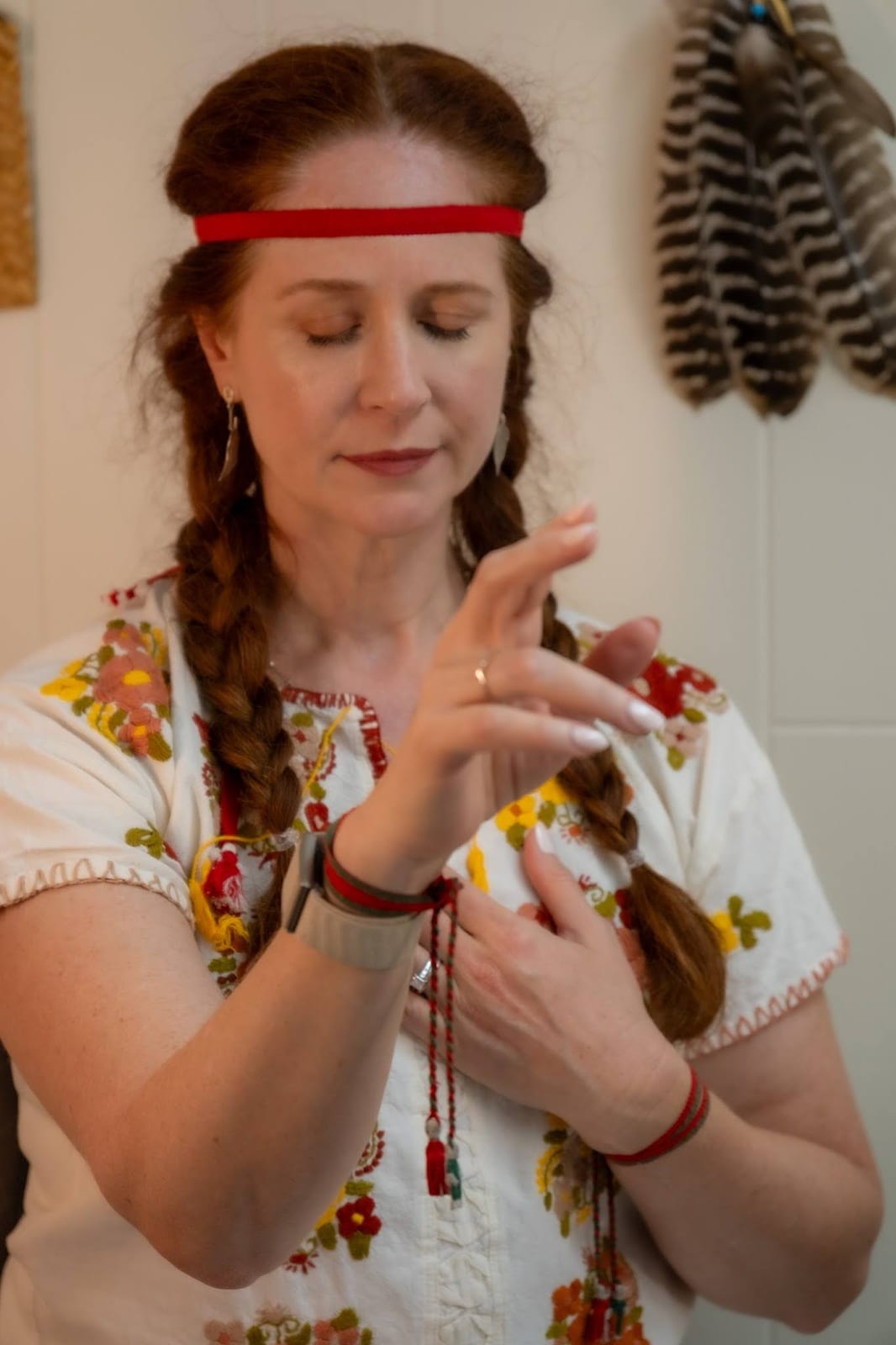 Marilyn practicing spiritual shamanic healing in traditional ceremonial clothing